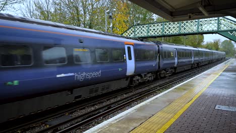 High-Speed-Train-Leaving-Sandwich-Station-In-Rainy-Day