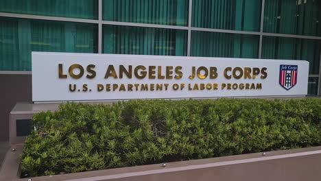 Los-Angeles-Job-Corps-Training-Centre-Sign-in-Front-of-Downtown-Building,-US-Department-of-Labor-Program