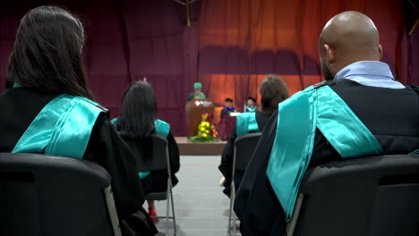 Slow-motion-shot-of-graduating-students-listening-to-the-university-director's-speech-in-Mexico