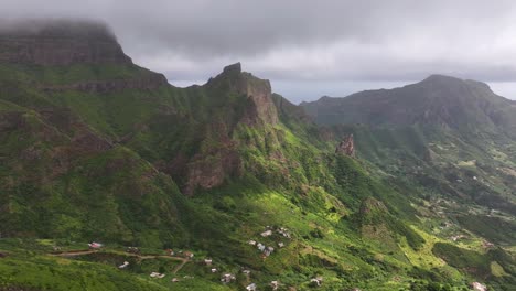 Drone-Shot,-Amazing-Landscape-Scenery-of-Santiago-Island,-Cape-Verde,-Green-Mountains-and-Homes-in-Valley