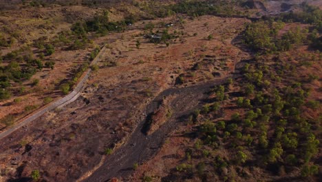 The-rugged-landscape-near-mountt-agung-in-tulamben,-bali-during-daytime,-aerial-view