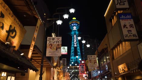 Tsutenkaku-Turm-Nachts-Beleuchtet-In-Osaka,-Japan