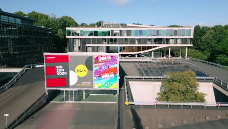 Footage-captures-the-modern-architectural-landmark-of-the-VPRO-headquarters-in-the-broadcast-city-of-Hilversum,-showcasing-its-unique-design-and-significance-in-media