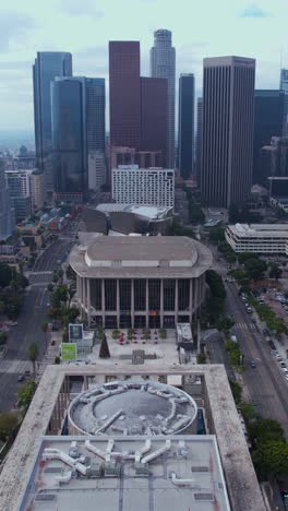 Los-Angeles-USA,-Vertical-Drone-Shot-of-Downtown,-Opera-and-Walt-Disney-Concert-Hall-Buildings