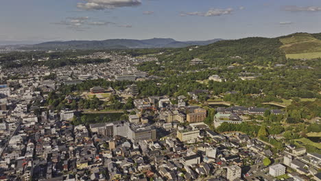 Nara-Japan-Aerial-v10-flyover-residential-area-across-Takabatakecho-and-Noboriojicho-capturing-Kōfuku-ji-Buddhist-Temples,-parks-and-hillside-mountain-views---Shot-with-Mavic-3-Pro-Cine---October-2023