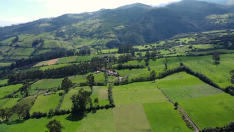 Aerial-dolly-drone-flight-towards-the-mountains-of-the-province-of-Pichincha,-Ecuador-in-Canton-Mejia-in-a-guitig-neighborhood