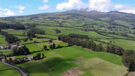 Drone-flight-of-the-Rumiñahui-volcan-and-the-green-fields-in-Ecuador-on-cloudy-day