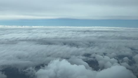 Immersive-pilot-POV-flying-between-layers-of-clouds,-shot-from-a-jet-cockpit