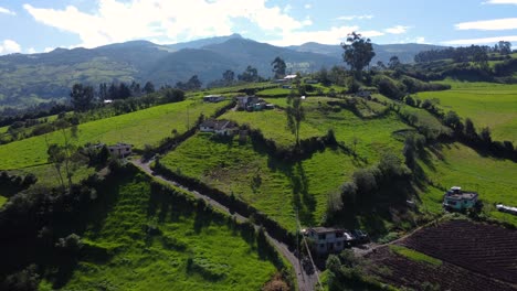 Drone-flight-at-the-foothills-of-the-Pasochoa-volcano-in-the-province-of-Pichincha,-Ecuador-with-hills,-mountains-in-the-background