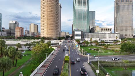 Aerial-flight-over-main-street-of-Tampa-City-with-skyscraper-buildings-of-downtown