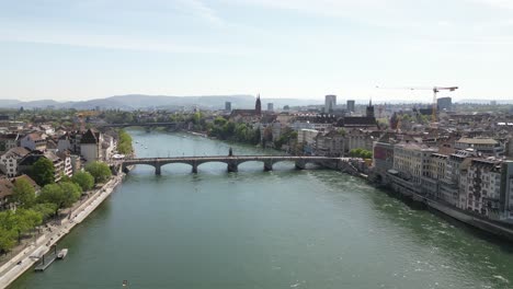 Cinematic-Shot-Of-Suspended-Unique-Basel-Bridge-Over-Water-Canal,-Switzerland