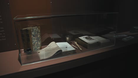 Historical-books-and-artifacts-displayed-in-a-glass-case-at-the-Chocolate-Museum