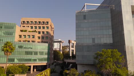 Flying-through-buildings-in-exclusive-Santa-Fe-area-and-railroads-under-construction-in-Mexico-City