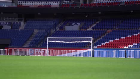 Folded-Goal-box-at-Parc-des-Princes-soccer-stadium-home-of-Paris-Saint-Germain-Football-team-showing-Qatar-logo,-Wide-shot