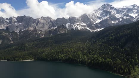 Eibsee-Bayern-Germany-aerial-view-of-snow-capped-mountains-above-the-lake