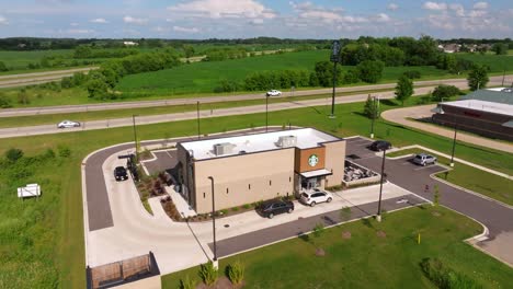 Fixed-Aerial-View-of-Cars-at-Starbucks-Drive-Thru-Windows