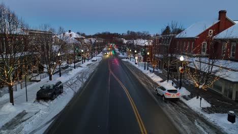 Festive-decorated-main-street-of-american-town-in-winter-snow