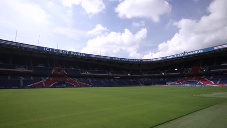 Soccer-field-grass-at-Parc-des-Princes-stadium-home-of-Paris-Saint-Germain-Football-team,-Aerial-pan-right-shot