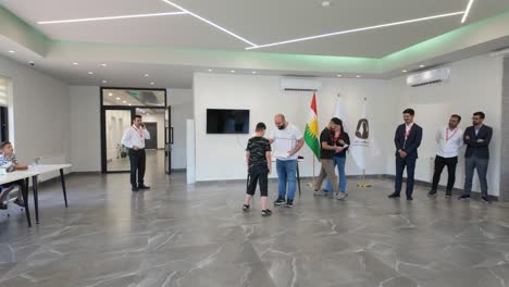 Deaf-children-at-a-special-needs-school-in-Soran,-Kurdistan-Iraq-receiving-achievement-awards