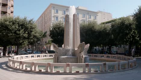 Fontanna-delle-Ancore-fountain-in-centre-of-Brindisi,-Italy,-static-shot