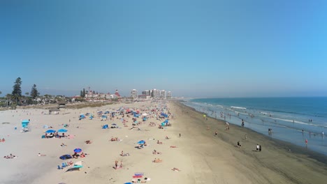 Coronado-Beach-Sandy-Shoreline-Filled-With-People-On-Summertime-In-San-Diego,-California-USA