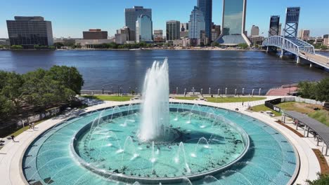 Aerial-drone-footage-of-Jacksonville,-Florida,-showcasing-the-Friendship-Fountain,-St