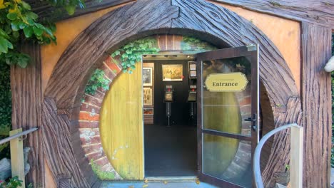 Hobbit-door-entrance-to-Weta-Cave-film-production-shop-and-museum-in-Wellington,-New-Zealand-Aotearoa