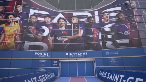 Entering-doors-of-Parc-des-Princes-stadium-home-of-Paris-Saint-Germain-Football-team,-Dolly-in-shot