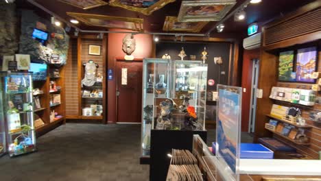 Inside-Weta-Cave-shop-and-museum-showcasing-models,-figurines-and-artefacts-from-films-in-Wellington,-New-Zealand-Aotearoa