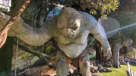 Trolls-from-the-Lord-of-the-Rings-films-located-outside-of-Weta-Cave-shop-and-museum-in-Wellington,-New-Zealand-Aotearoa