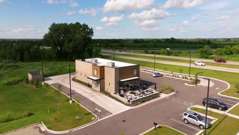 Aerial-Boom-Shot-Above-Starbucks-Coffeehouse-and-Drive-Thru