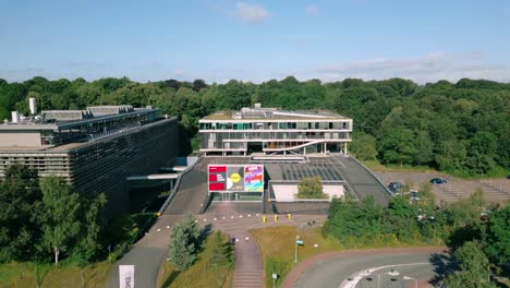 Footage-shows-the-modern-office-buildings-of-VPRO,-BNNVARA,-and-NTR-at-the-Media-Park-broadcast-hub-in-Hilversum,-highlighting-their-architectural-design-and-media-significance