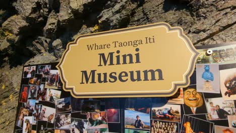 Close-up-of-mini-museum-sign-in-Weta-Cave-film-production-shop-located-in-Wellington,-New-Zealand-Aotearoa