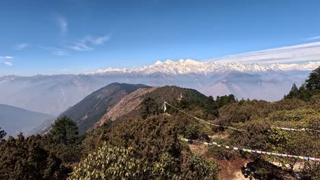 Tranquil-High-Altitude-View-of-Ganesh-Himal:-Snowy-Summits,-mountain-ridge-with-forests-–-Ideal-for-Exploring-Nepal's-Natural-Wonders