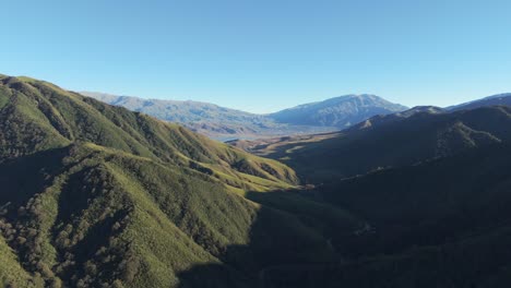 Experience-the-mesmerizing-Yungas-Forest-Mountain-range,-from-a-bird's-eye-view-in-this-drone-footage,-drone-moves-backward-to-capture-this-beautiful-view