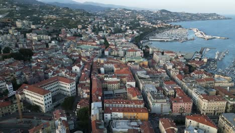 Establishing-aerial-overview-of-Sanremo-Italy-along-the-coast-looking-out-to-sea