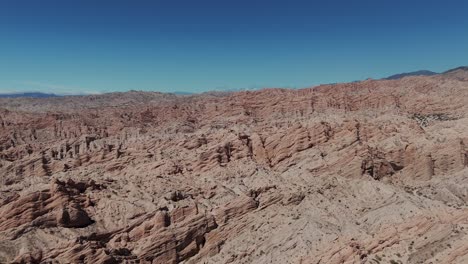 Drone-view-in-4K-of-Quebrada-de-las-Flechas,-a-stunning-geological-formation-in-Salta-Province,-Argentina