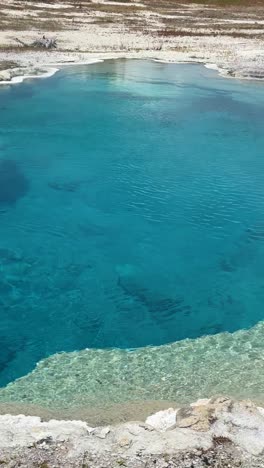 Vertical-4k,-Clear-Water-and-Natural-Geothermal-Pool-in-Yellowstone-National-Park,-Wyoming-USA