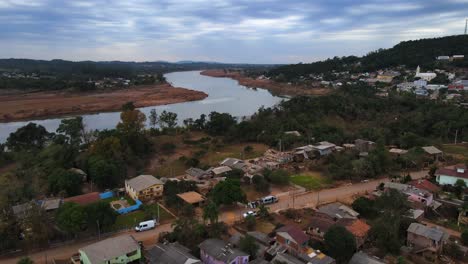 South-Brazil-Floods-2024---Aerial-drone-shot-of-Taquari-River-and-aftermath-of-floods-in-Cruzeiro-do-Sul-City---Rio-Grande-do-Sul