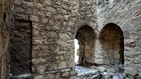 Stone-walls-and-arches-within-the-Genoese-Fortress-in-Feodosia,-Russia