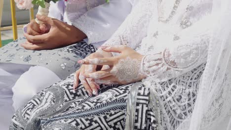 Closeup-View-Of-Traditional-Wedding-Bride's-Hands-Painted-With-Henna