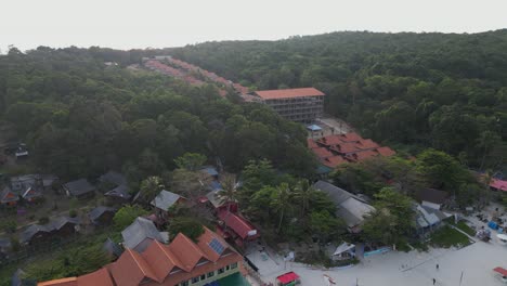 Aerial-photograph-showcasing-Long-Beach-in-Malaysia,-highlighting-the-scenic-beach,-resort-buildings,-and-surrounding-tropical-landscape