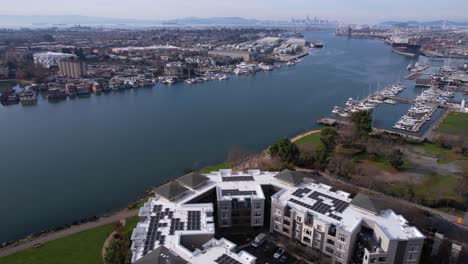 Aerial-View-of-Alameda-and-Jack-London-Square-on-Oakland-Estuary,-City-Waterfront-on-Sunny-Day,-California-USA