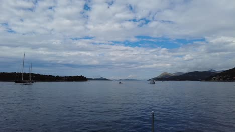 Serene-views-of-the-calm-sea-surface-captured-from-a-gently-floating-boat-amidst-the-Elafiti-Islands,-Croatia,-offering-a-tranquil-maritime-escape