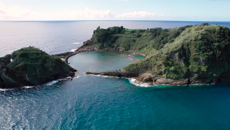 Ariel-shot-of-a-small-island,-near-São-Miguel-Island,-Portugal