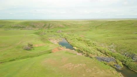 Scenic-Green-Fields-And-River-In-The-Countryside---Aerial-Drone-Shot