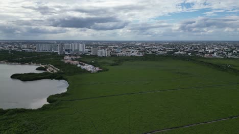 Dolly-shot-horizon-flyover-Nichupte-mangrove-lagoon-in-Cancun,-Mexico