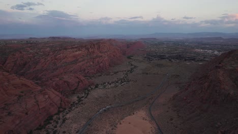 Aerial-Flyover-Of-Snow-Canyon-State-Park-At-Red-Cliffs-Desert-Reserve-In-Utah-At-Sunset