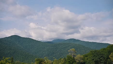 Timelapse-of-clouds-passing-over-the-vibrant-eastern-mountains-of-Georgia