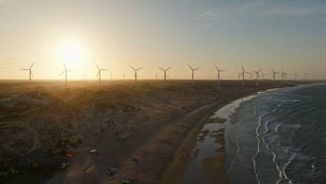 Windräder-In-Den-Dünen-Während-Eines-Windigen-Sonnenuntergangs-In-Brasilien